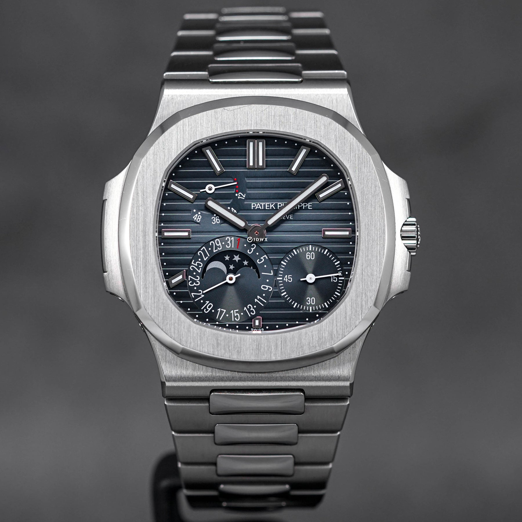 PATEK PHILIPPE NAUTILUS 5712 1A MOONPHASE BLUE DIAL 2017 OMNILUXE