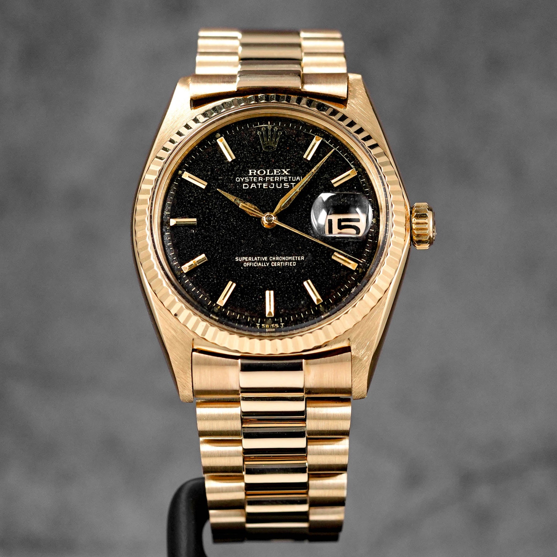 ROLEX DATEJUST 36MM YELLOWGOLD BLACK GILT DIAL SWORD HANDS (WATCH