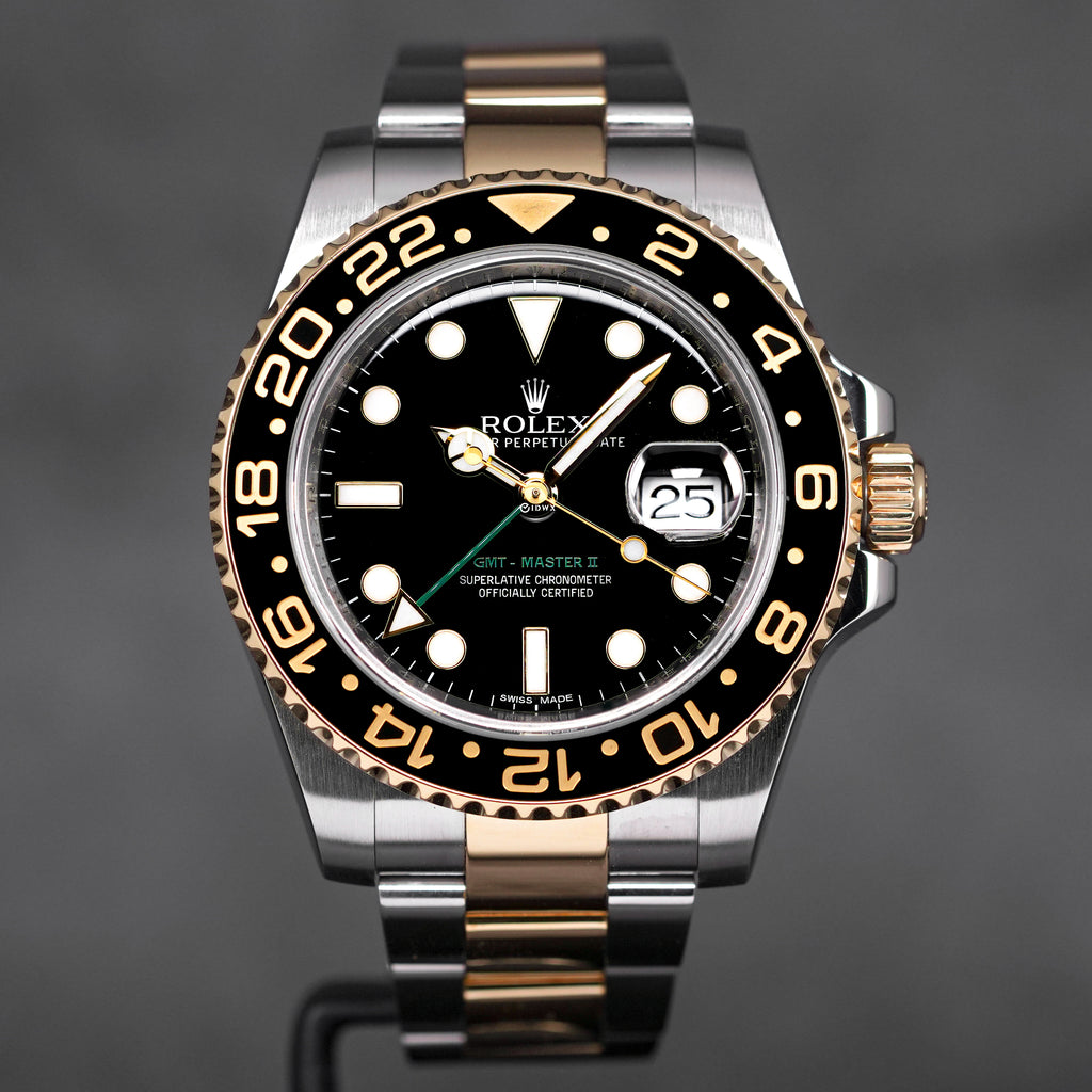 ROLEX GMT MASTER II TWOTONE YELLOWGOLD BLACK DIAL 2010 OMNILUXE