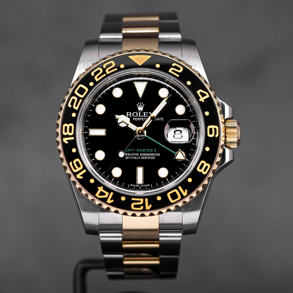 ROLEX GMT MASTER II TWOTONE YELLOWGOLD BLACK DIAL M SERIES UNDATED CIRCA 2008 OMNILUXE