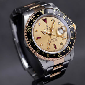 GMT MASTER-II TWOTONE YELLOWGOLD CHAMPAGNE DIAL DIAMOND INDEX WITH RUBY 'S SERIES' (CIRCA 1993)
