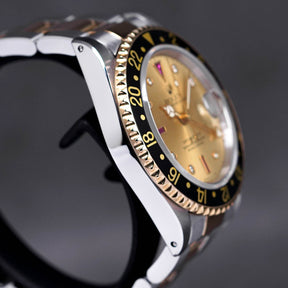 GMT MASTER-II TWOTONE YELLOWGOLD CHAMPAGNE DIAL DIAMOND INDEX WITH RUBY 'S SERIES' (CIRCA 1993)