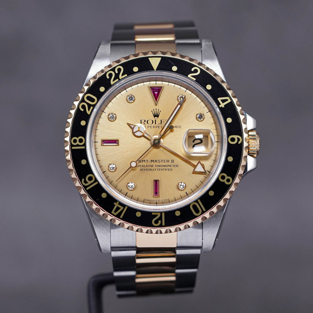 GMT MASTER-II TWOTONE YELLOWGOLD CHAMPAGNE DIAL DIAMOND INDEX WITH RUBY 'S SERIES' (CIRCA 1993)