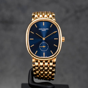 GOLDEN ELLIPSE 3978 YELLOWGOLD BLUE DIAL SMALL SECOND (1995)