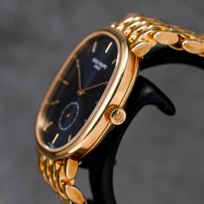 GOLDEN ELLIPSE 3978 YELLOWGOLD BLUE DIAL SMALL SECOND (1995)