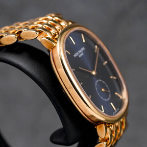 GOLDEN ELLIPSE 3978 YELLOWGOLD BLUE DIAL SMALL SECOND (1995)