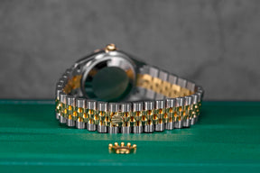 DATEJUST 31MM TWOTONE YELLOWGOLD DARK GREY ROMAN DIAL DIAMOND ON VI (2025)