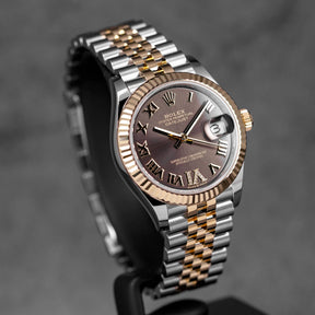 DATEJUST 31MM TWOTONE YELLOWGOLD DARK GREY ROMAN DIAL DIAMOND ON VI (2025)