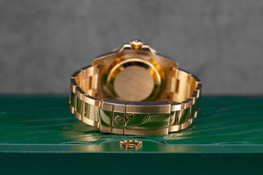 Harga Rolex GMT Master II Yellowgold Black