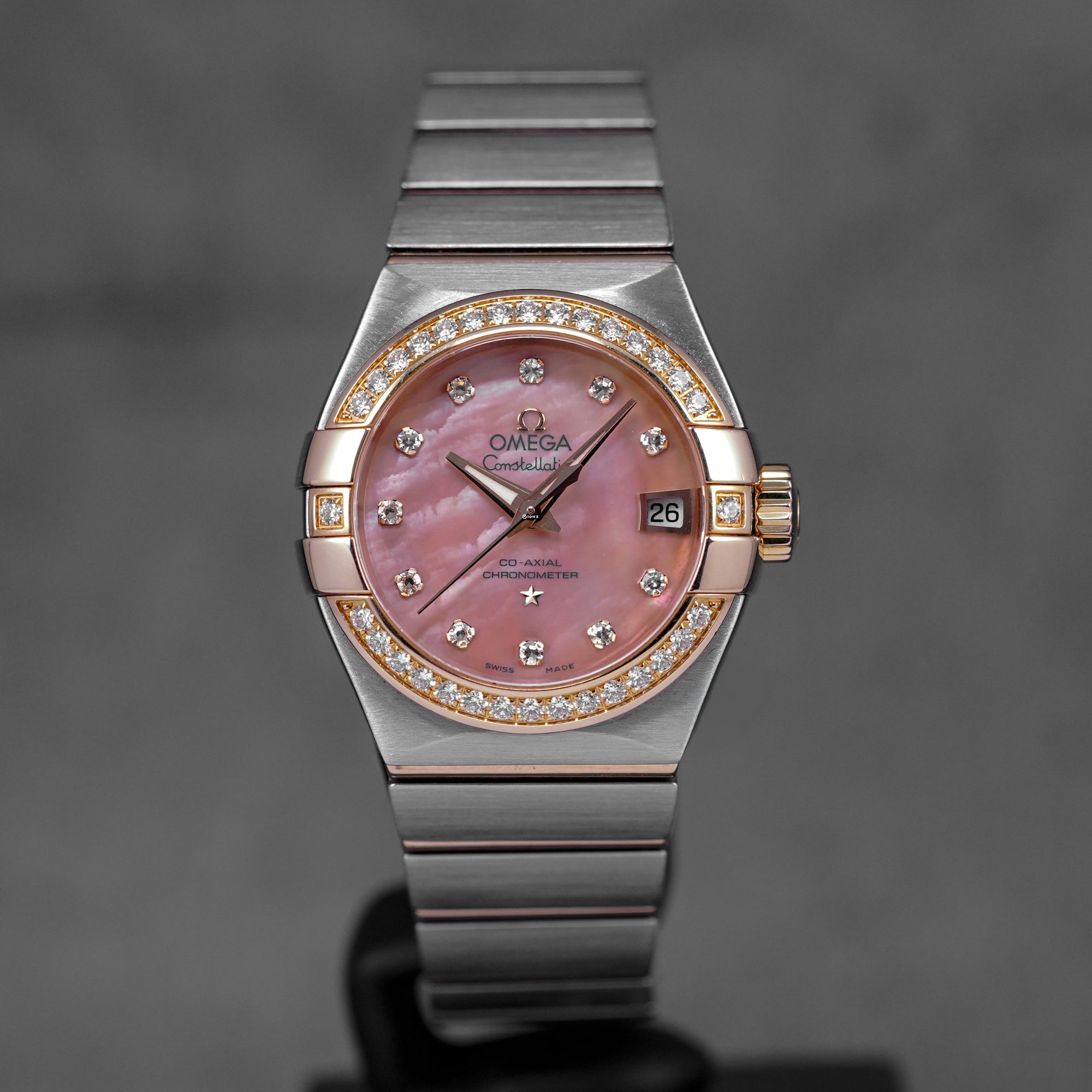 harga omega constellation rosegold mop