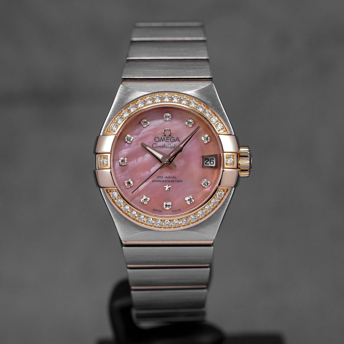 harga omega constellation rosegold mop