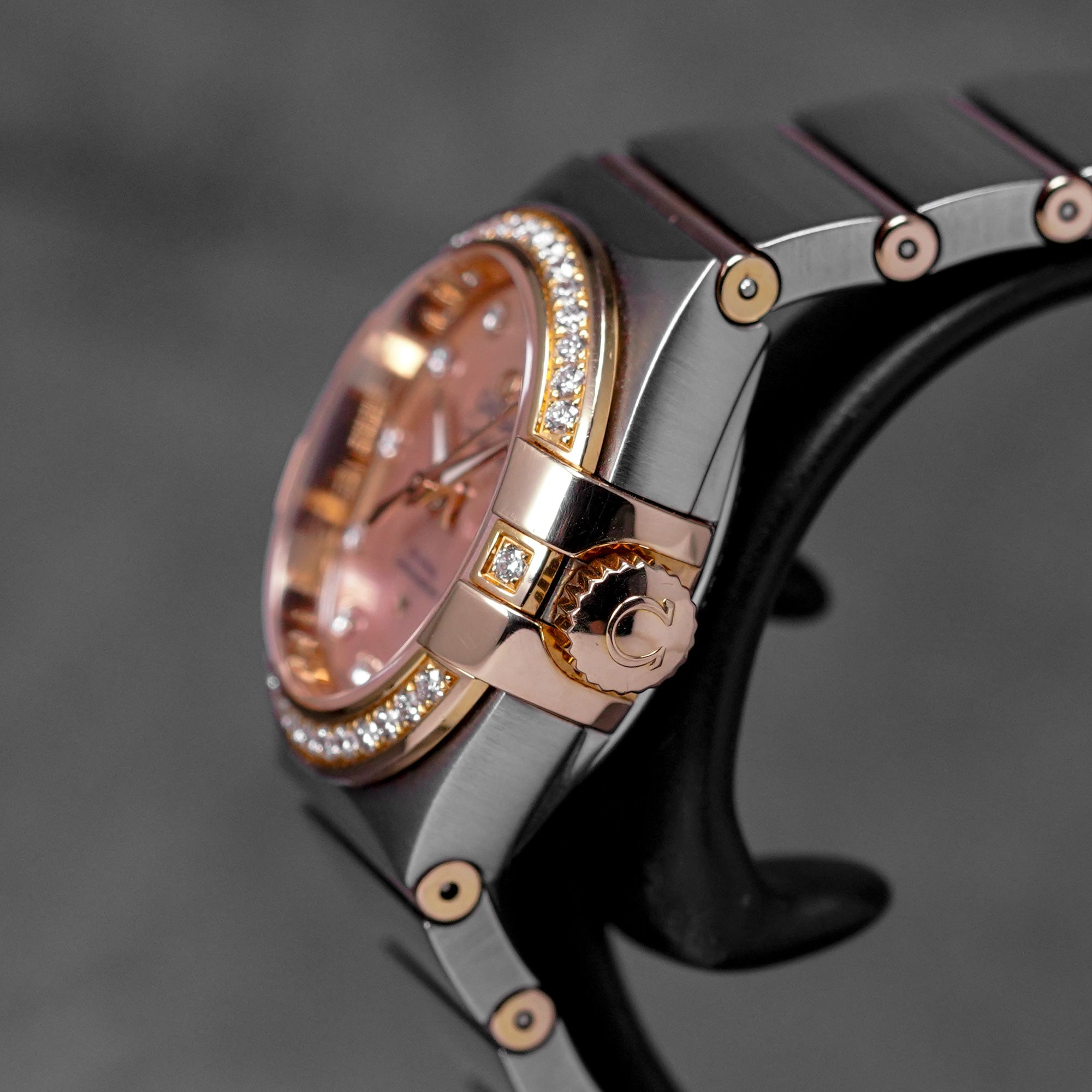 harga omega constellation rosegold mop