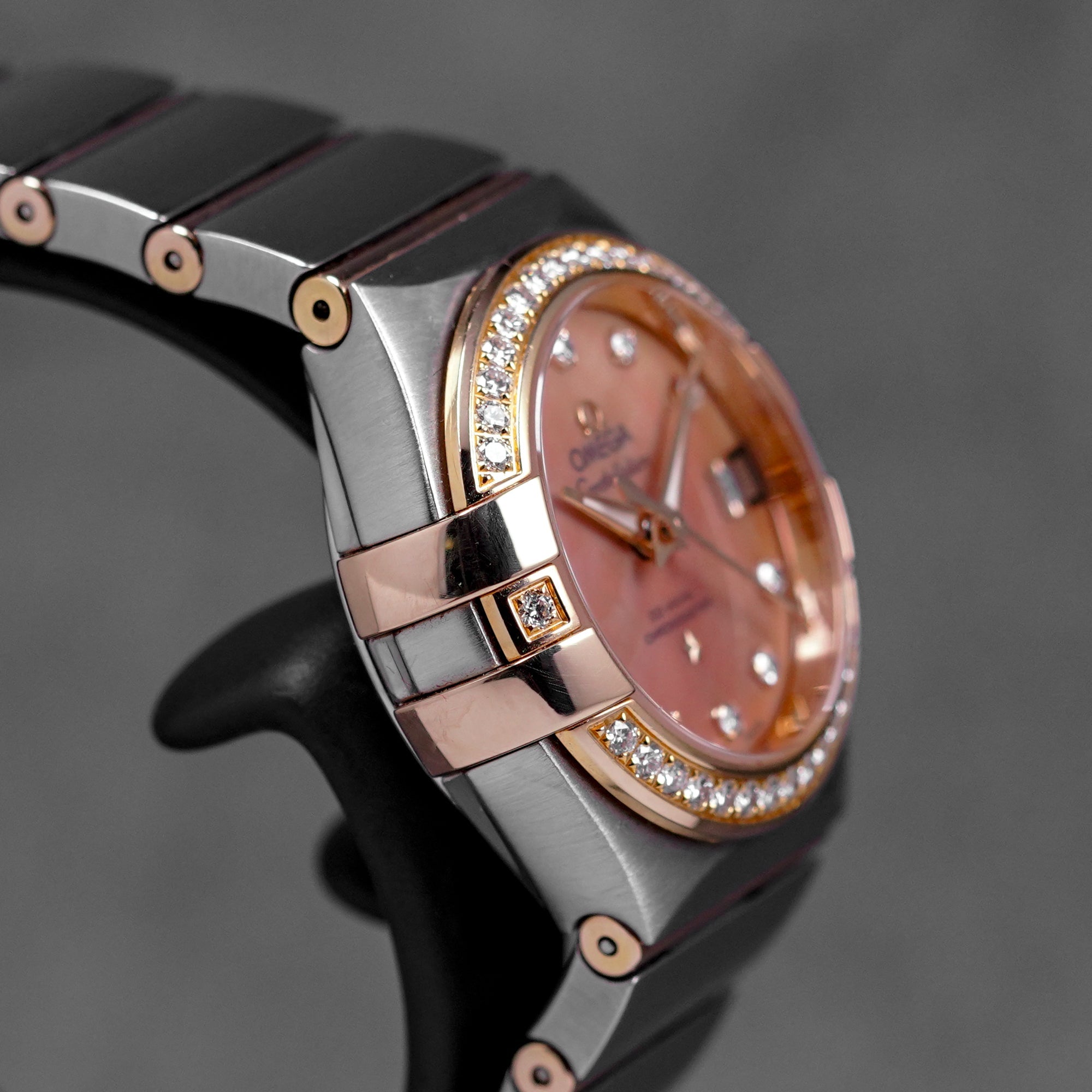 harga omega constellation rosegold mop
