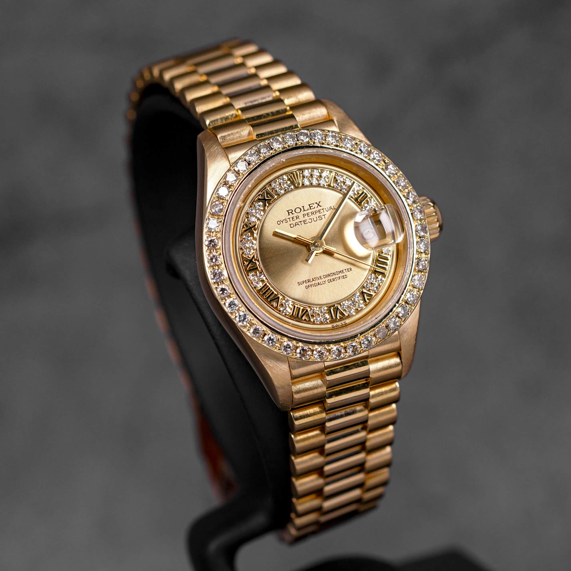 DATEJUST 26MM YELLOWGOLD CHAMPAGNE ROMAN DIAMOND DIAL DIAMOND BEZEL (WATCH ONLY)