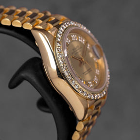 DATEJUST 26MM YELLOWGOLD CHAMPAGNE ROMAN DIAMOND DIAL DIAMOND BEZEL (WATCH ONLY)