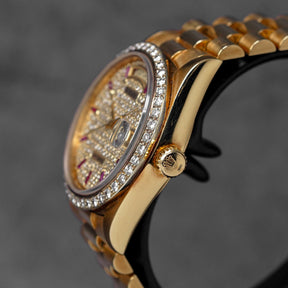 DAYDATE 36MM 18038 YELLOWGOLD CUSTOM DIAMOND & RUBY DIAL DIAMOND BEZEL (WATCH & BOX)