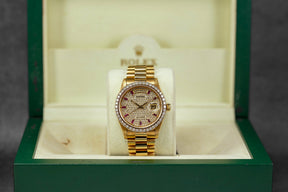 DAYDATE 36MM 18038 YELLOWGOLD CUSTOM DIAMOND & RUBY DIAL DIAMOND BEZEL (WATCH & BOX)