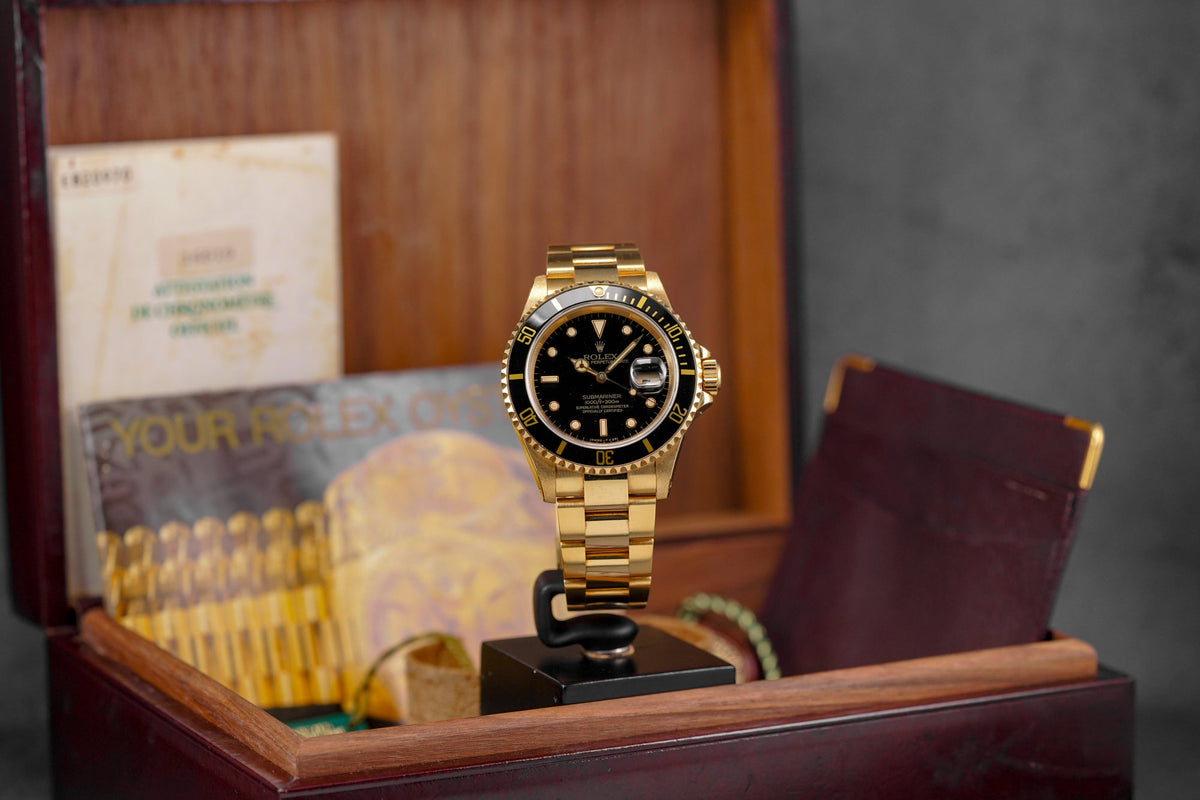 SUBMARINER DATE 40MM YELLOWGOLD BLACK DIAL (1995)